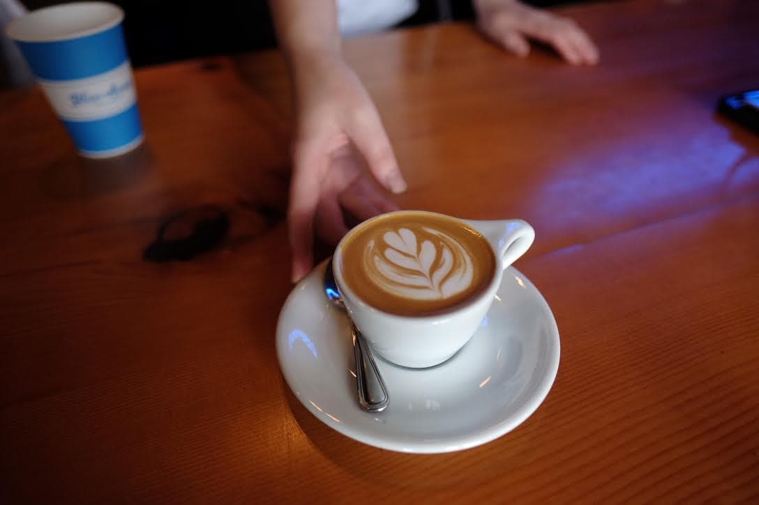 Latte art being poured