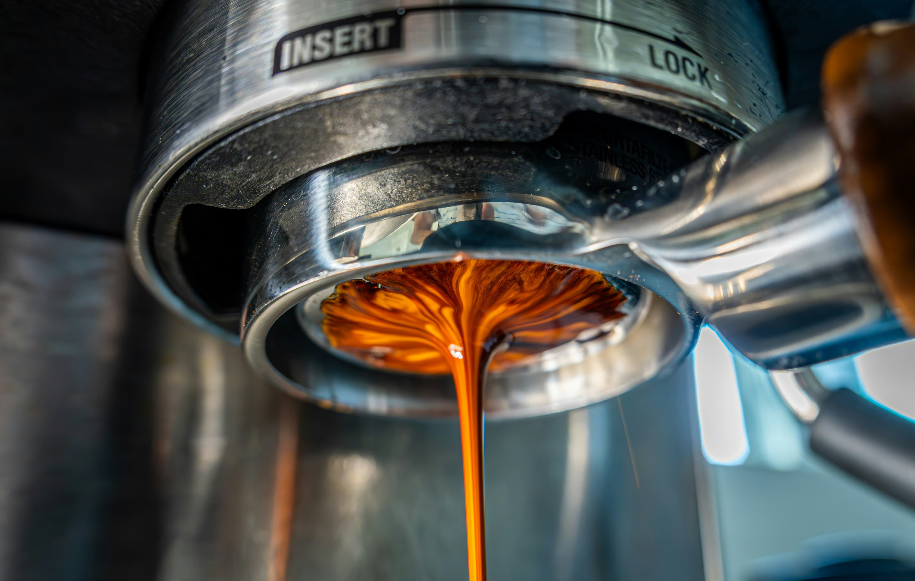 Espresso pouring from a portafilter